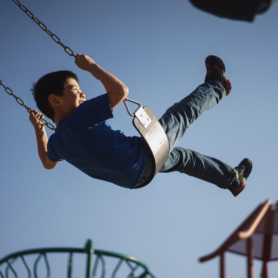 a boy on a swing